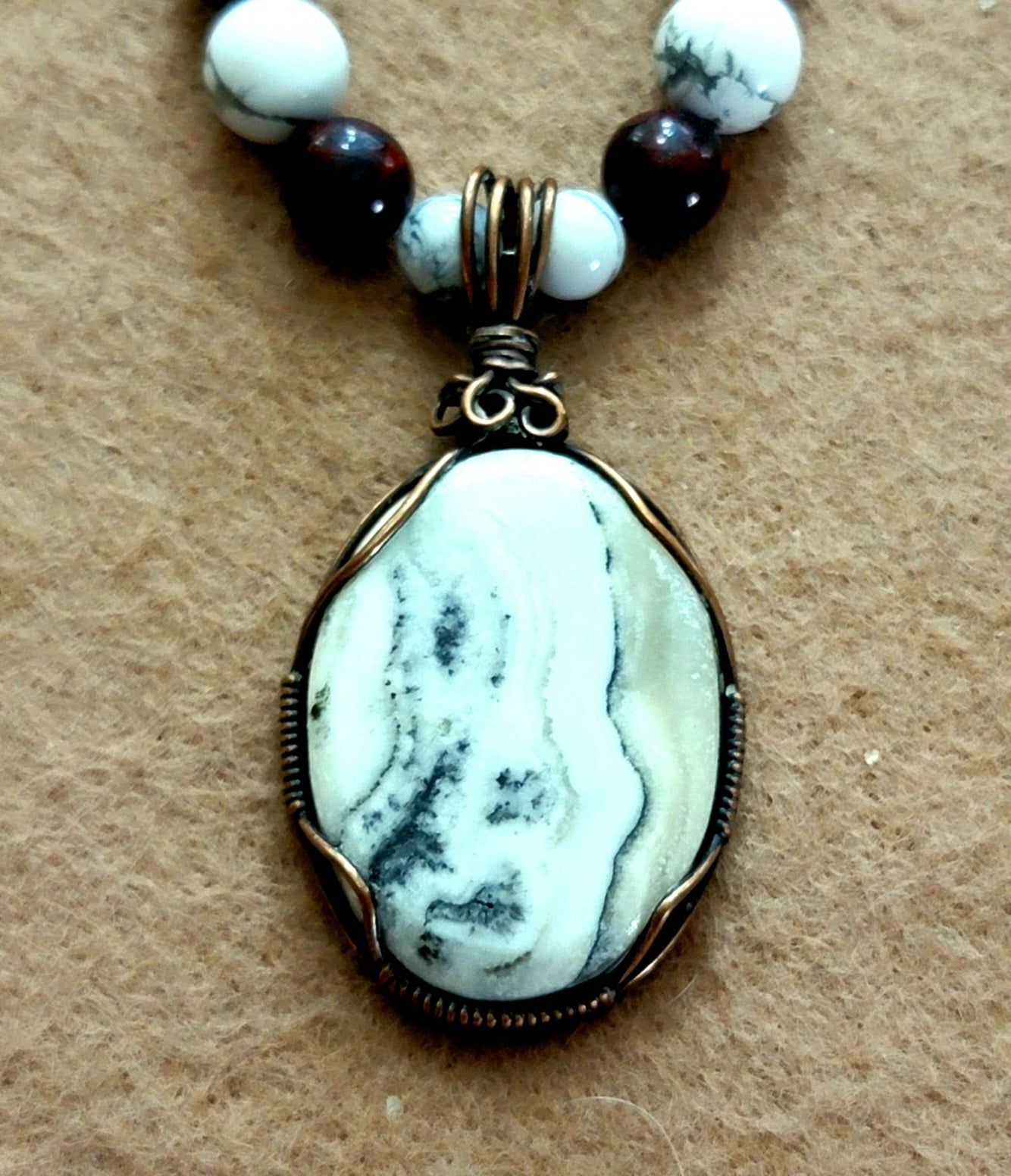 Silver Lace Onyx Pendant: Howlite, Bloodstone, Red Tiger Eye, Bone & Seed