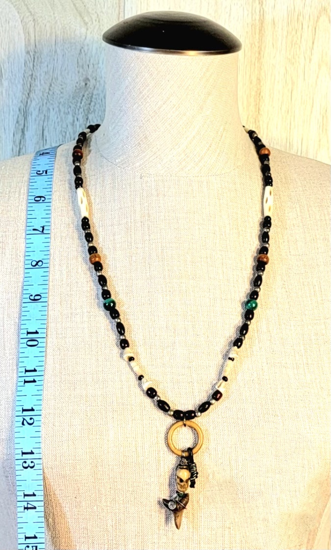 2 Shark Tooth necklaces: Sold as a pair.