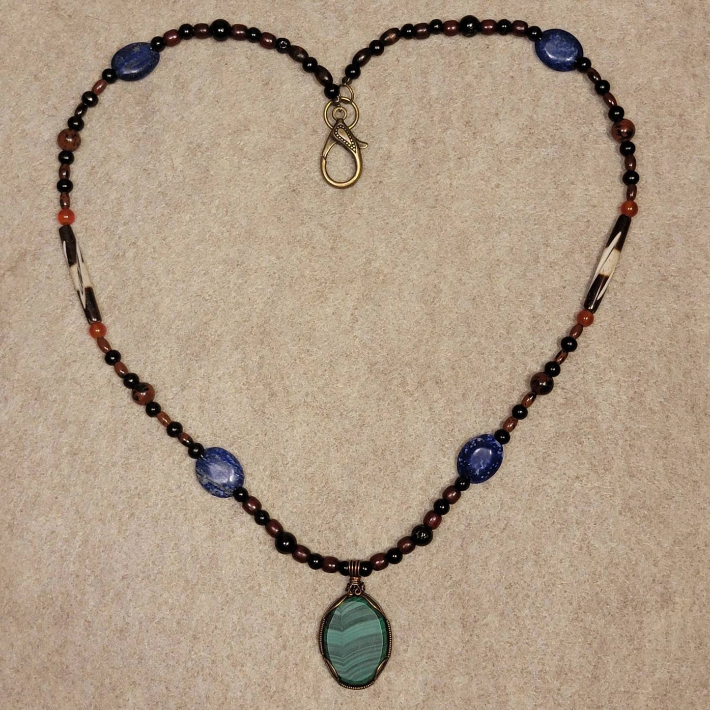 Gorgeous Malachite Cabachon pedant W/ Lapis Lazuli, Tourmaline, Mahogany, Carnelian and Bone beads