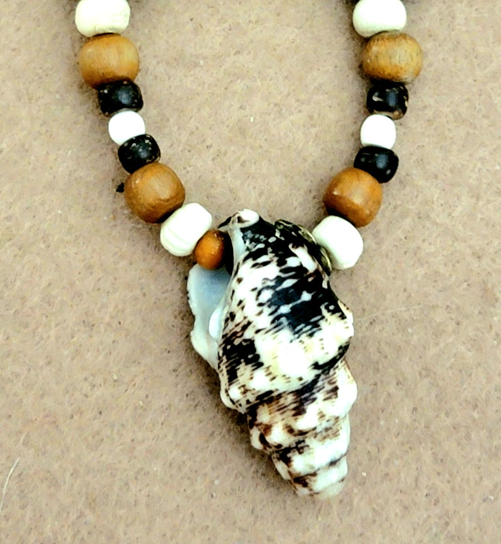 Shell Pendant: Shell, Bone, Seed, Wood & Kukui Nut
