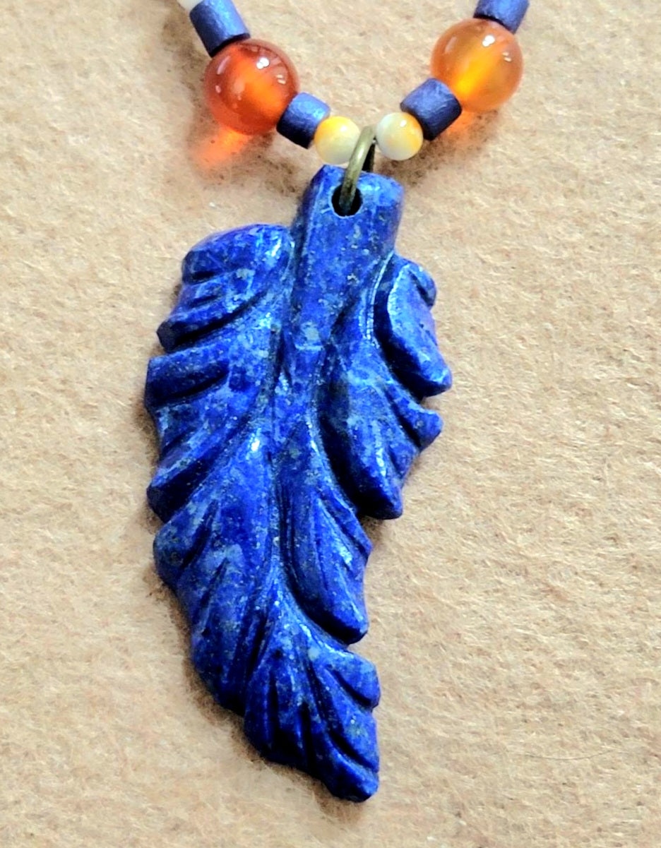 Lapis Leaf Pendant: Carnelian, Oyster Shell  & Reed.