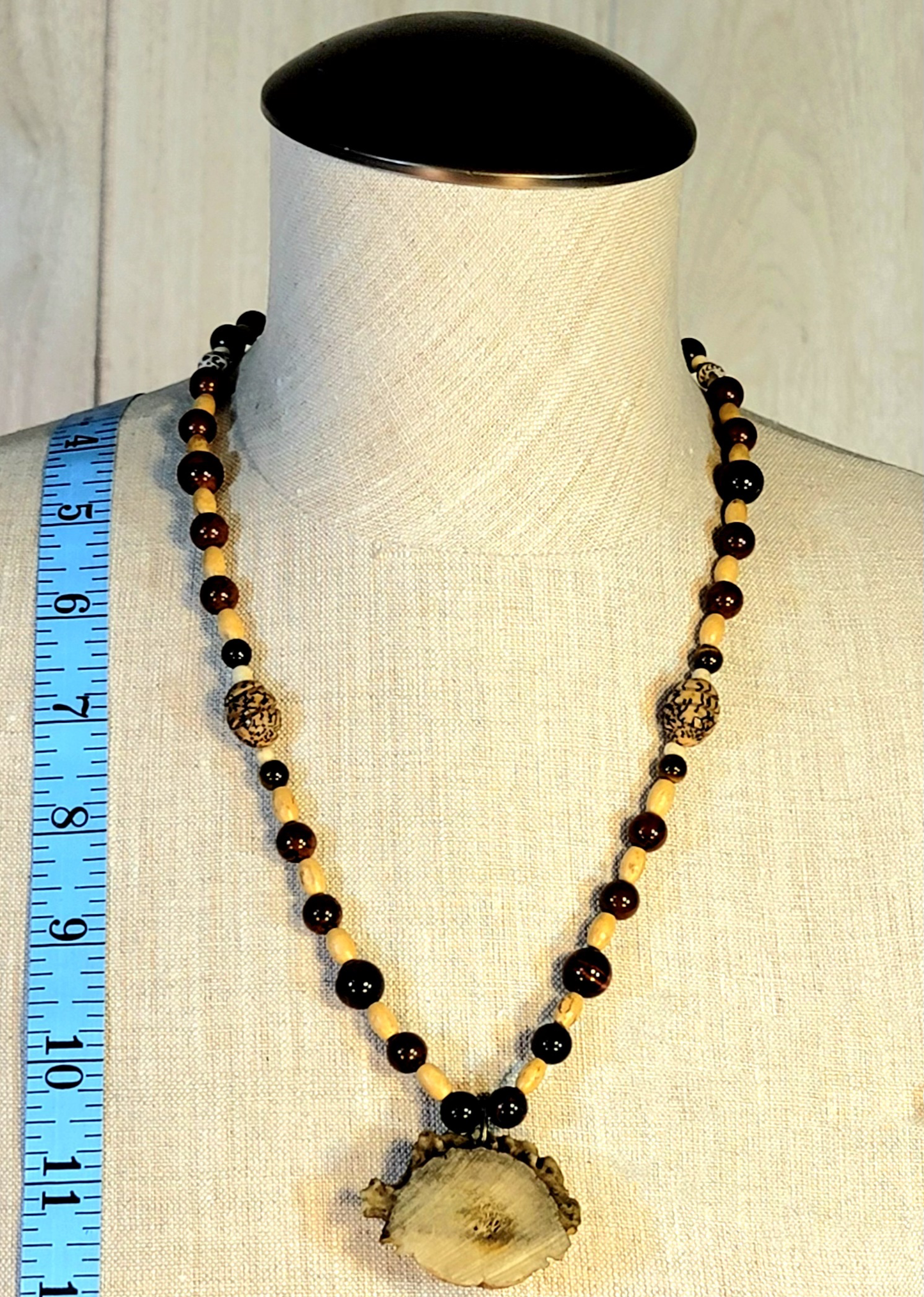 1 Antler Button Necklace. 1 Antler Point Necklace. Sold as a pair.
