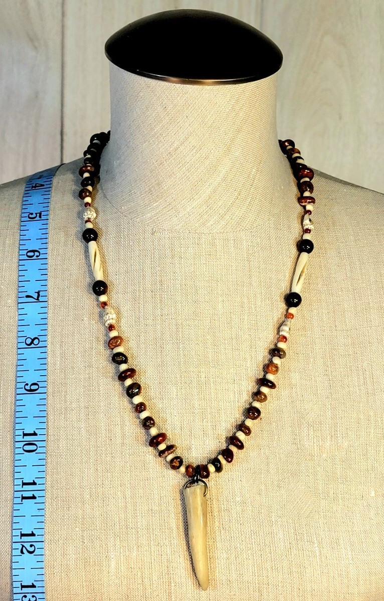 1 Antler Button Necklace. 1 Antler Point Necklace. Sold as a pair.