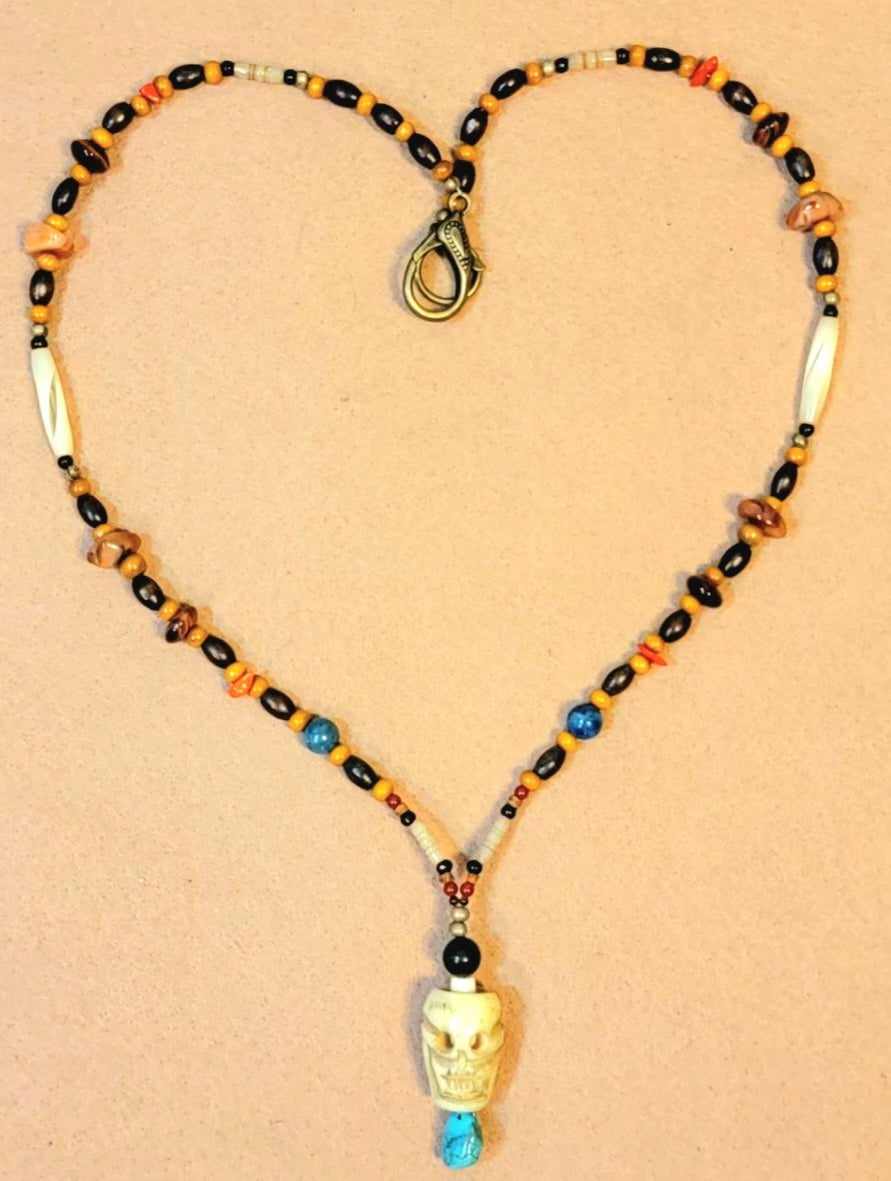 1 Skull Bone Drop Bead & Tiger Eye necklace, 1 Skull Bone Drop Bead & Turquoise necklace. Sold as a pair.