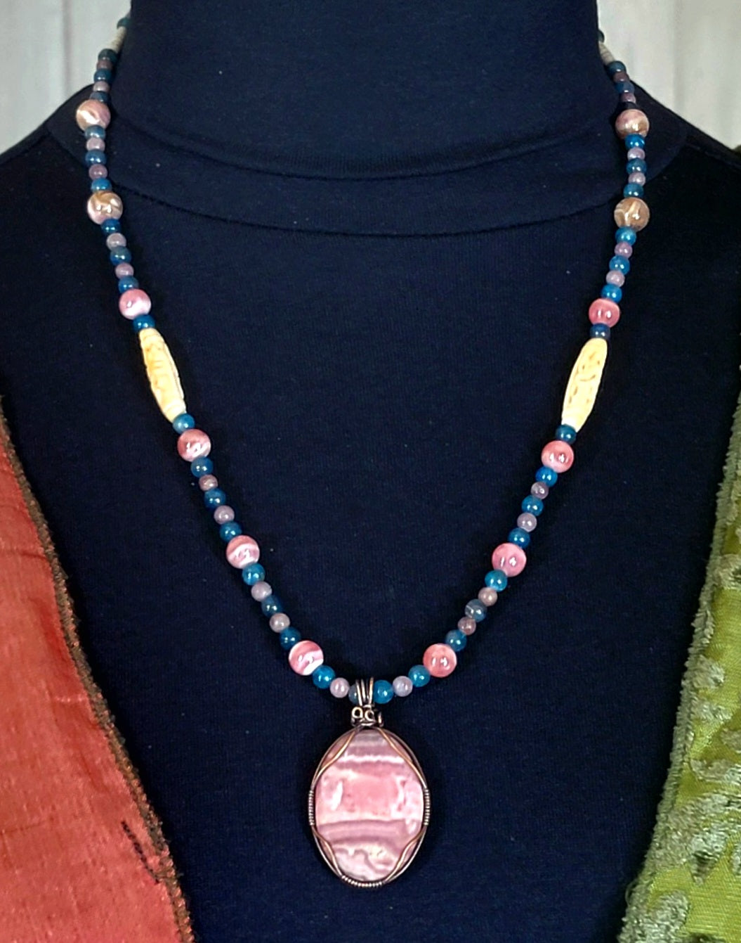 Rhodochrosite Cabochon:  Apatite, Pink Tourmaline, Rhodonite & Bone