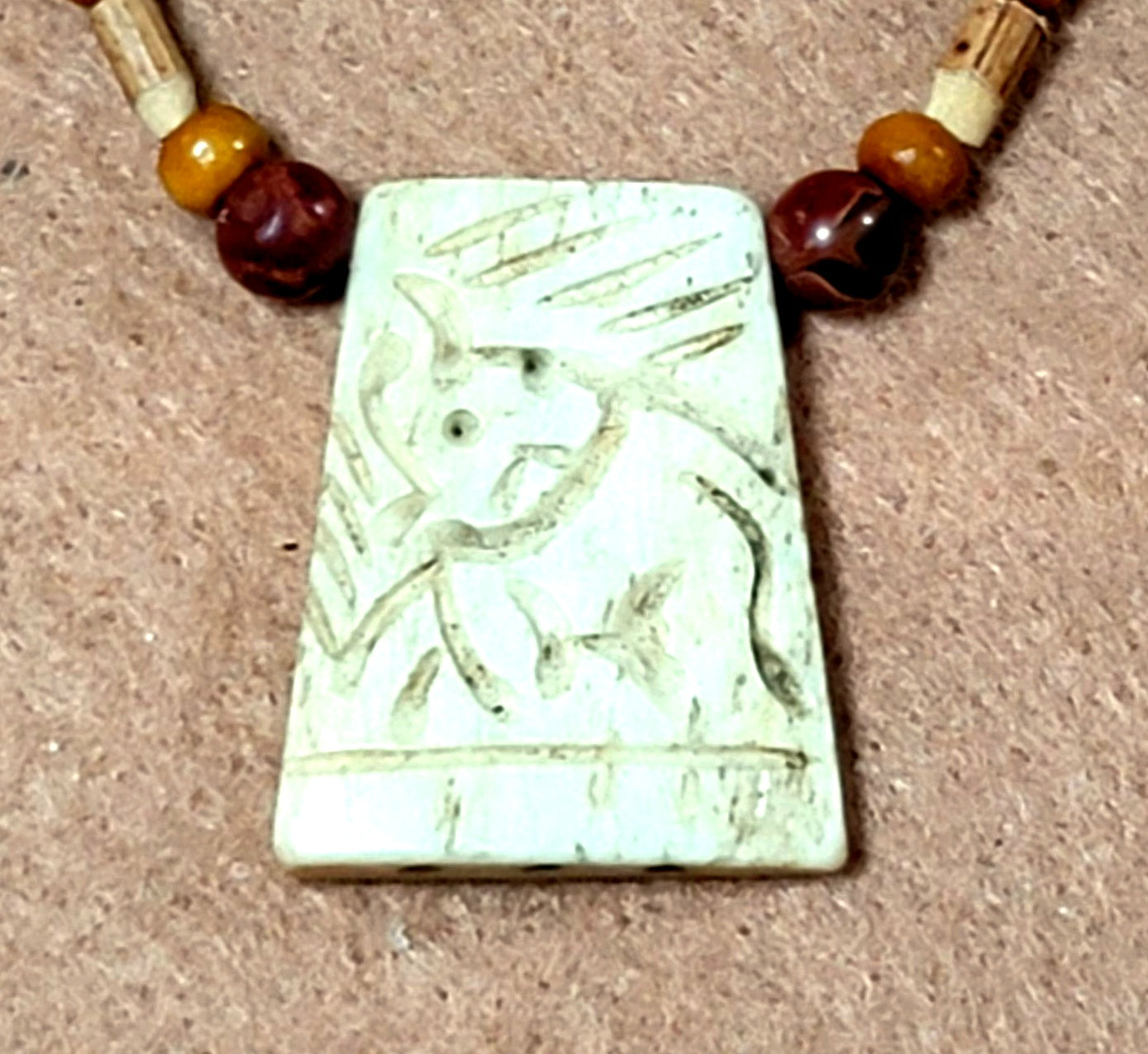 Carved Bone Pendant: Mahogany Obsidian, Reed, Shell & Bone