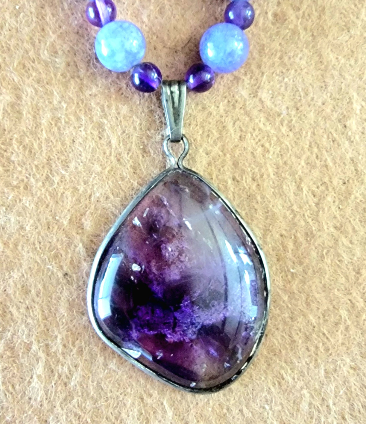 4Peaks Amethyst (rare) Cabochon: Lapidilite & Sugalite