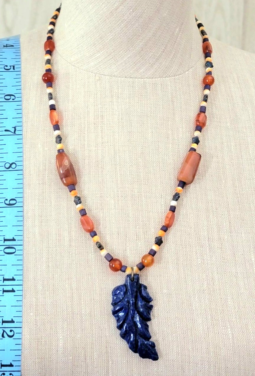 Lapis Leaf Pendant: Carnelian, Oyster Shell  & Reed.