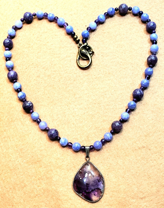 4Peaks Amethyst (rare) Cabochon: Lapidilite & Sugalite