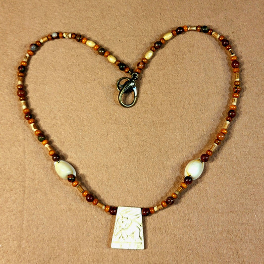 Carved Bone Pendant:  Mahogany Obsidian, Reed, Shell & Bone