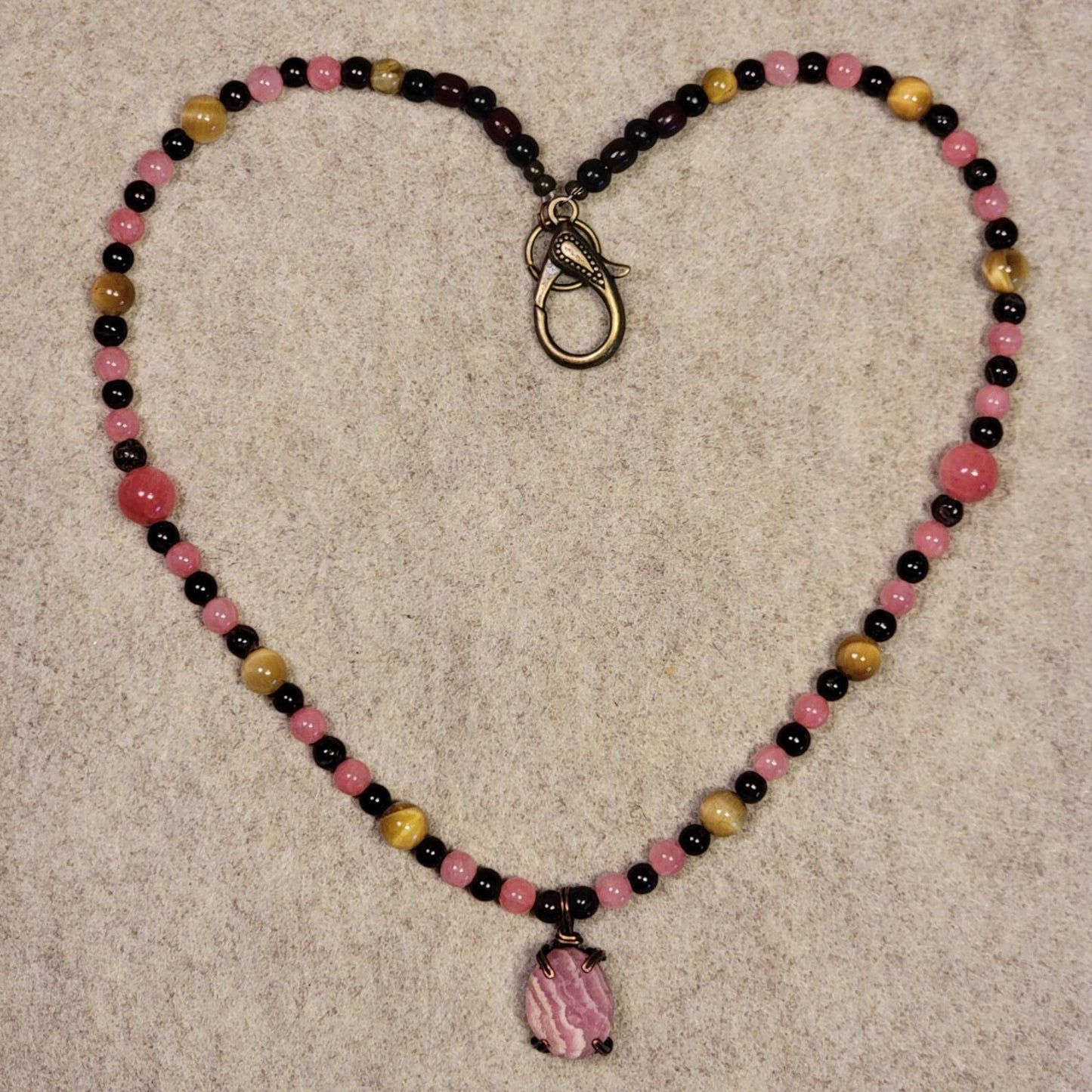 Rhodochrosite Cabochon:  Rose Quartz, Yellow Tiger Eye & Garnet