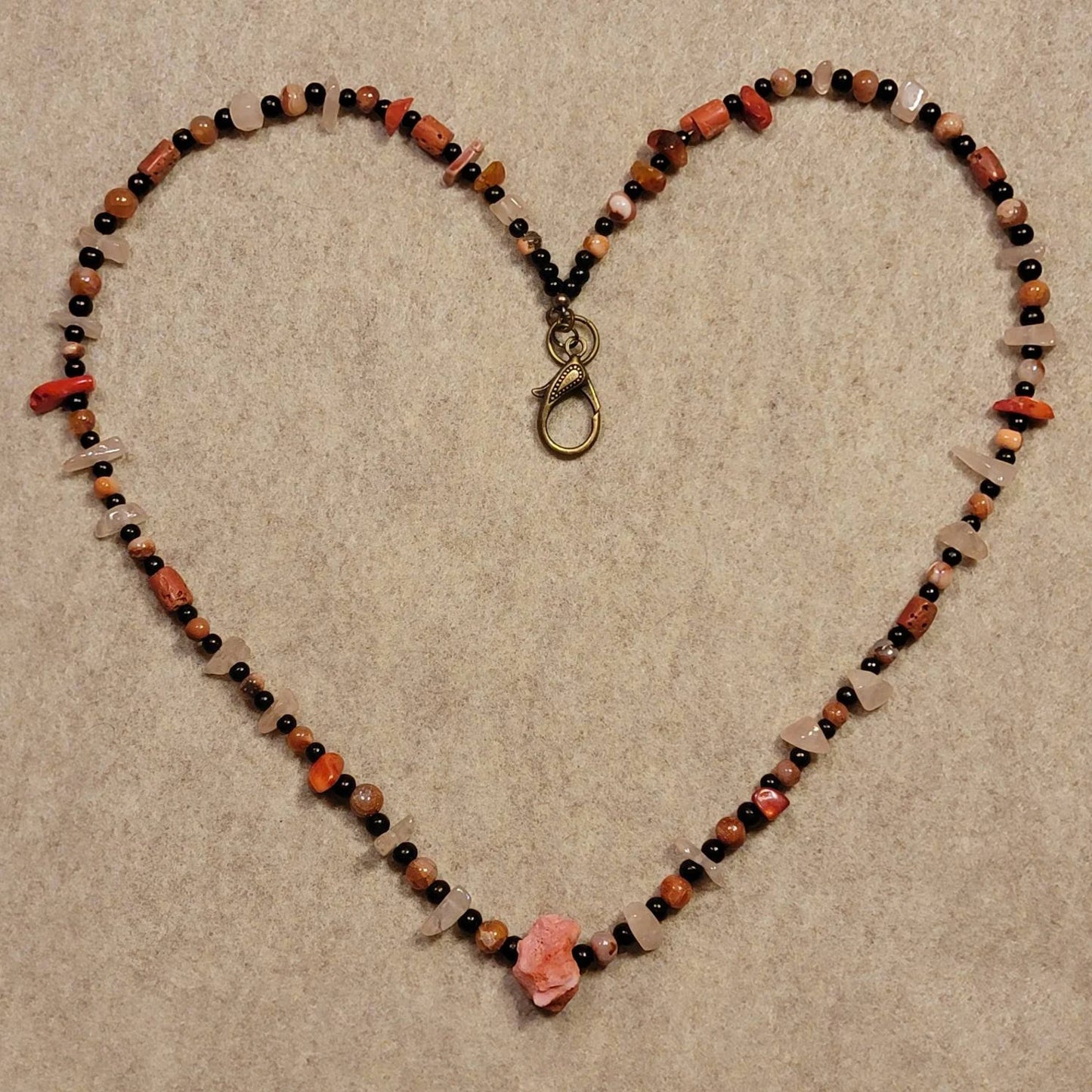 This beautifully bright Coral, Rose Quartz and Agate necklace is fun and classy at the same time