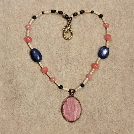 Rhodochrosite Cabochon:  Rose Quartz, Lapis Lazuli, Lava and Bone beads