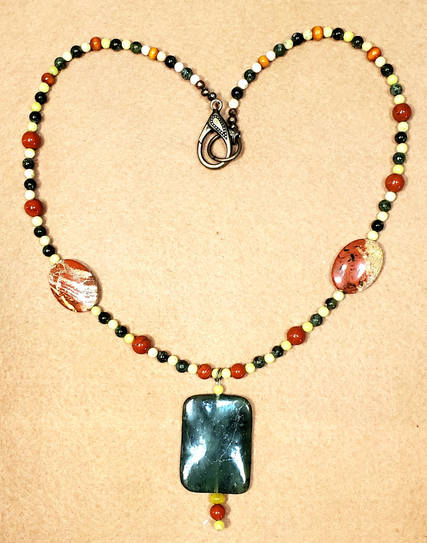 Jade Ribbon Drop Bead:                   Cappuccino Jasper, Red Jasper & Yellow Turquoise.