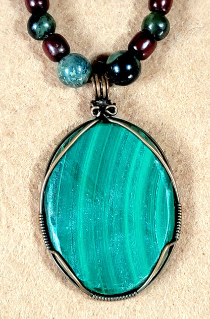 Malachite Cabochon: Sold as a pair.