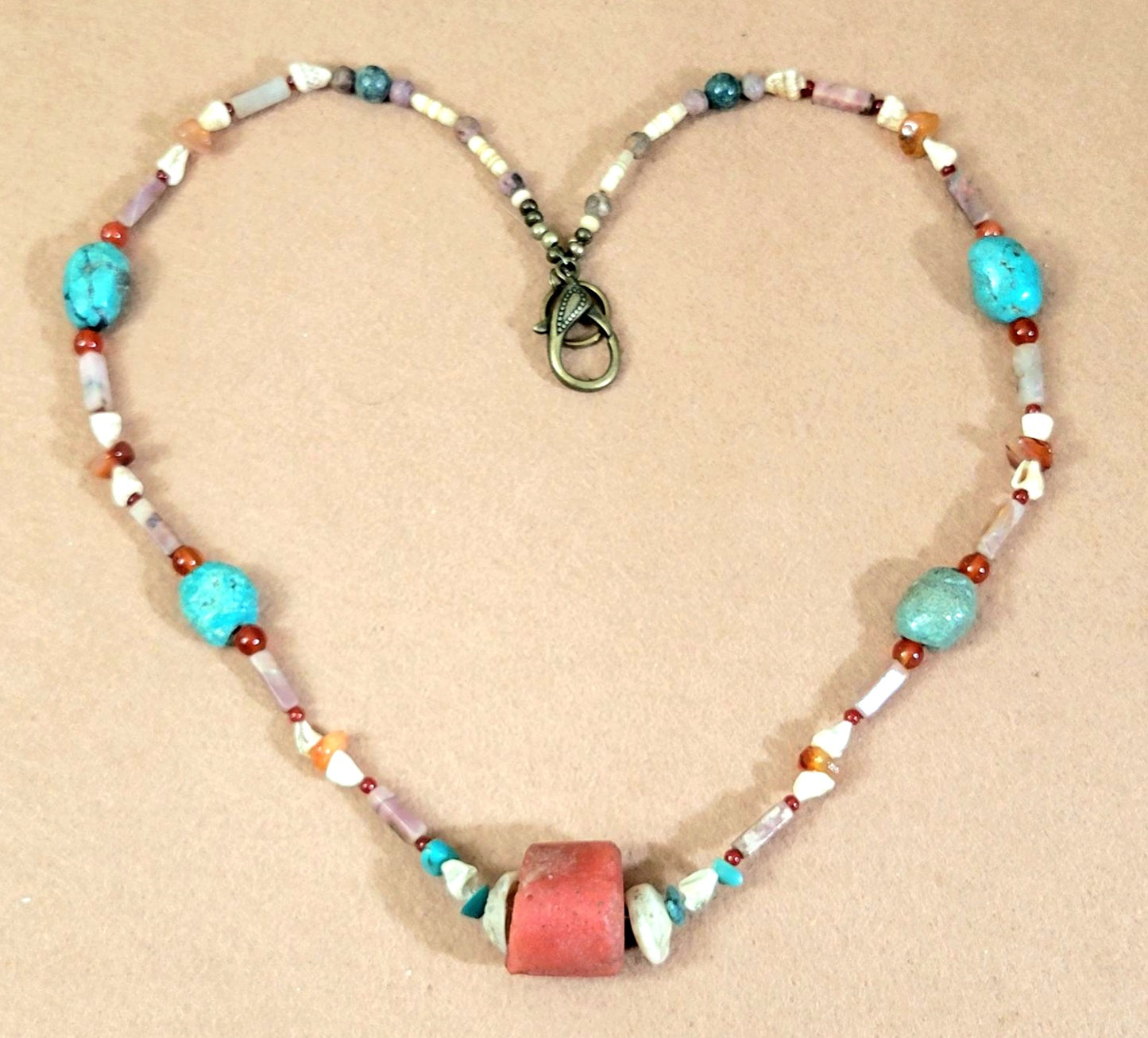 Coral center bead: Turquoise, Rhodonite, Coral, Carnelian, Shell & Bone