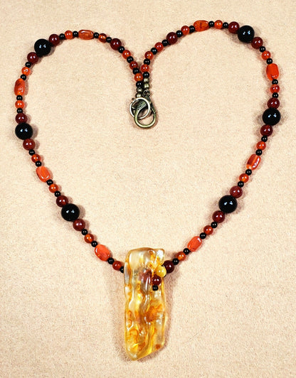 Amber Pendant:  Carnelian & Black Onyx