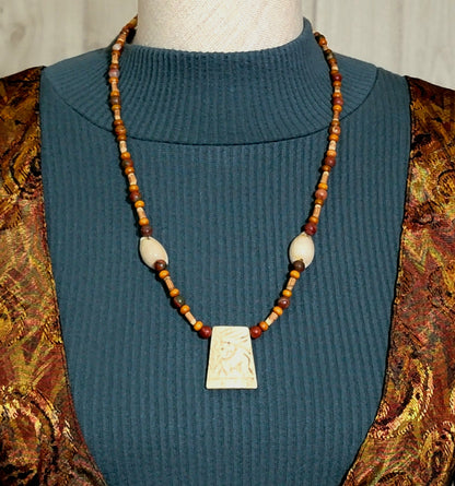 Carved Bone Pendant:  Mahogany Obsidian, Reed, Shell & Bone