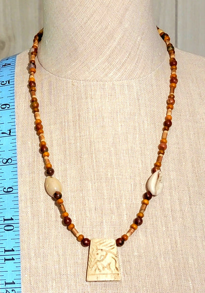 Carved Bone Pendant:  Mahogany Obsidian, Reed, Shell & Bone