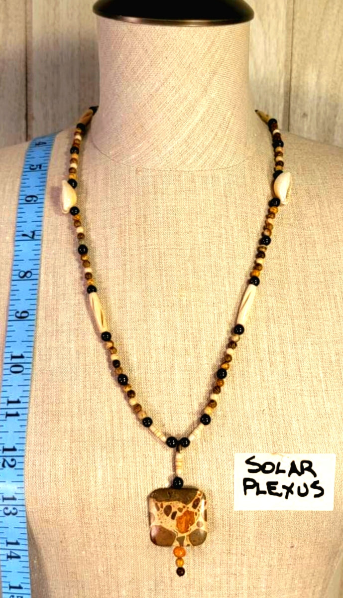 Safari Jasper Drop Bead: Garnet, Jasper, Bone, Shell & Seed. Creating an earthly balanced necklace.